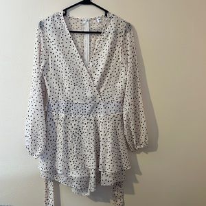 Polka Dot Long sleeve Romper with plunging neckline. Size small.